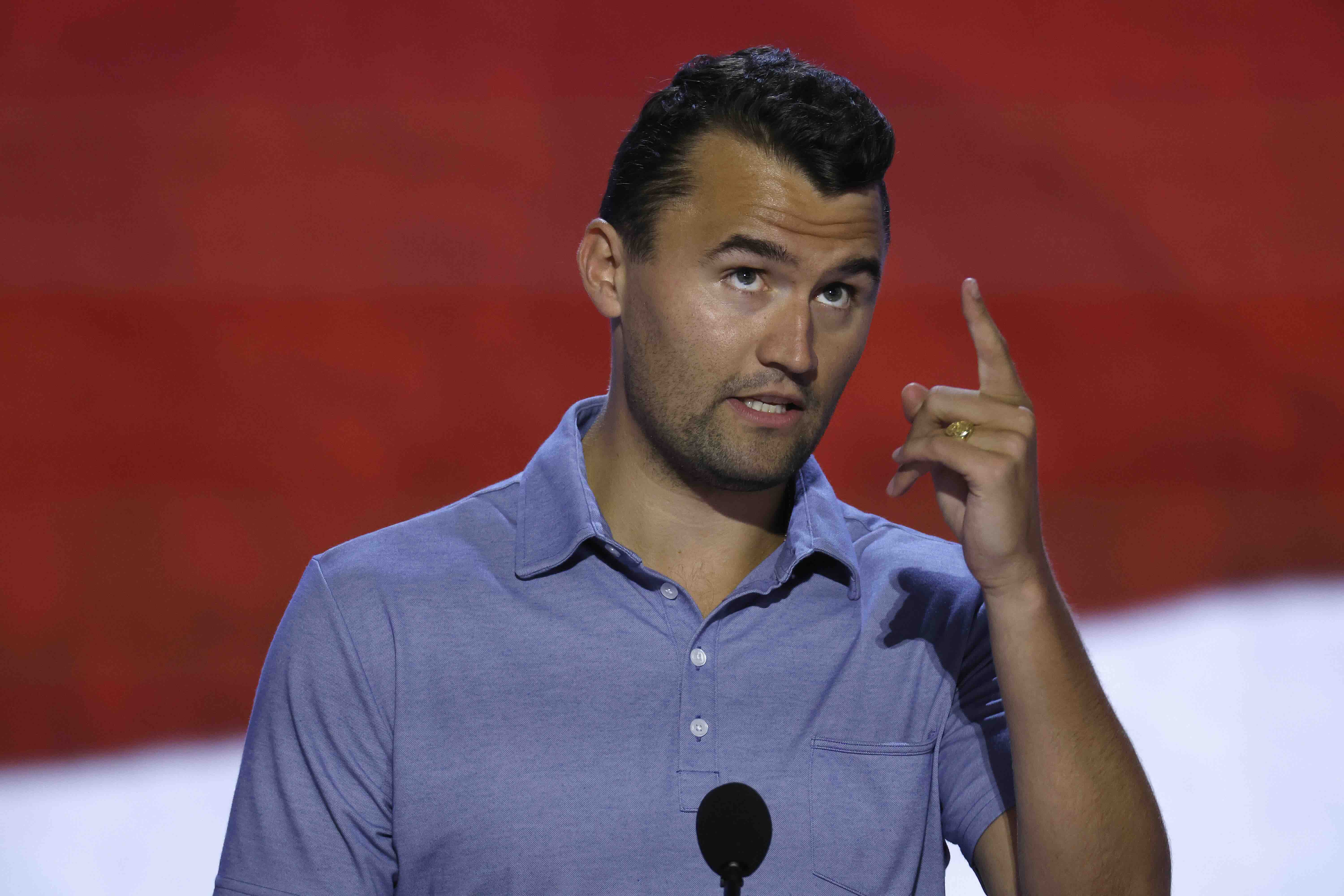 MILWAUKEE, WISCONSIN - JULY 14: Turning Point USA Founder Charlie Kirk is seen onstage at the Fiserv Forum during preparat...